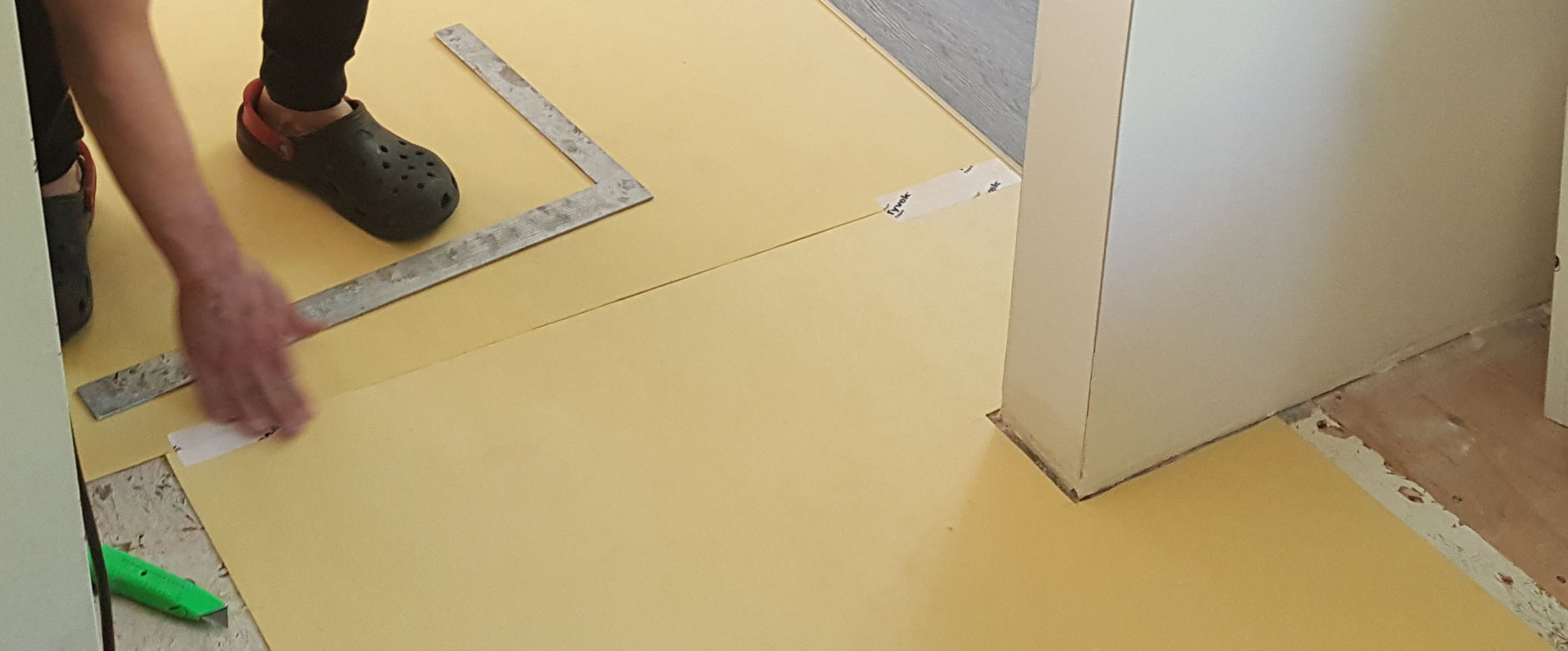 Underlayment around kit door